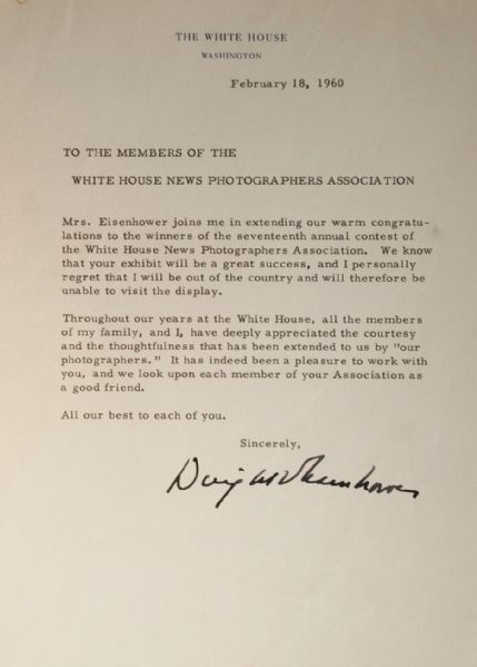 Dwight Eisenhower awards the White House News Photographer's