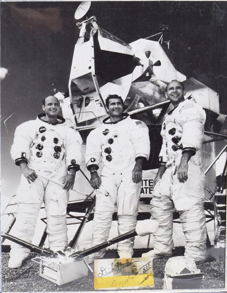 Apollo 12 Collection with piece of Apollo 12 Kapton foil signed by Gordon, Official Launch Card signed by Bean and commemorative envelope signed by Conrad.